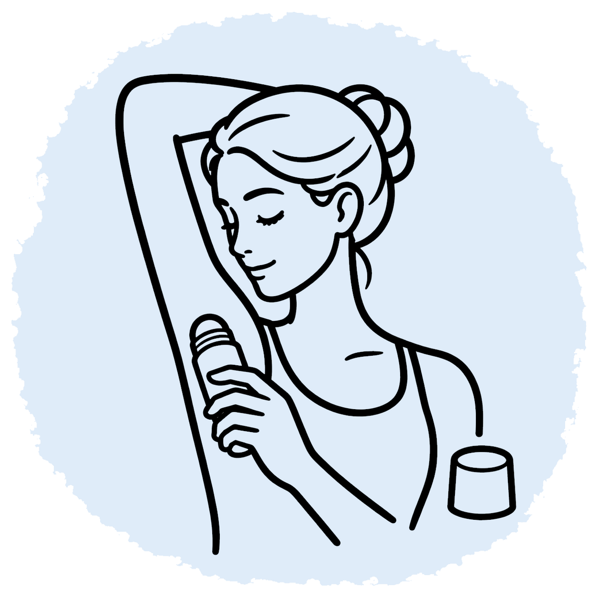 Woman applying roll-on deodorant under her raised arm