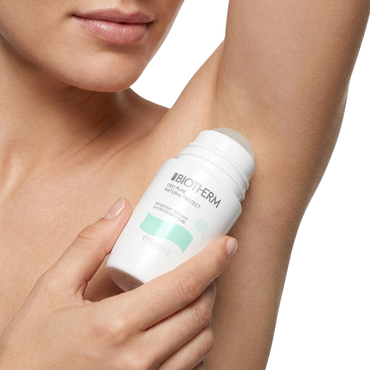 Biotherm Deo Pure Natural Protect roll-on deodorant applied to underarm, aluminum-free natural deodorant