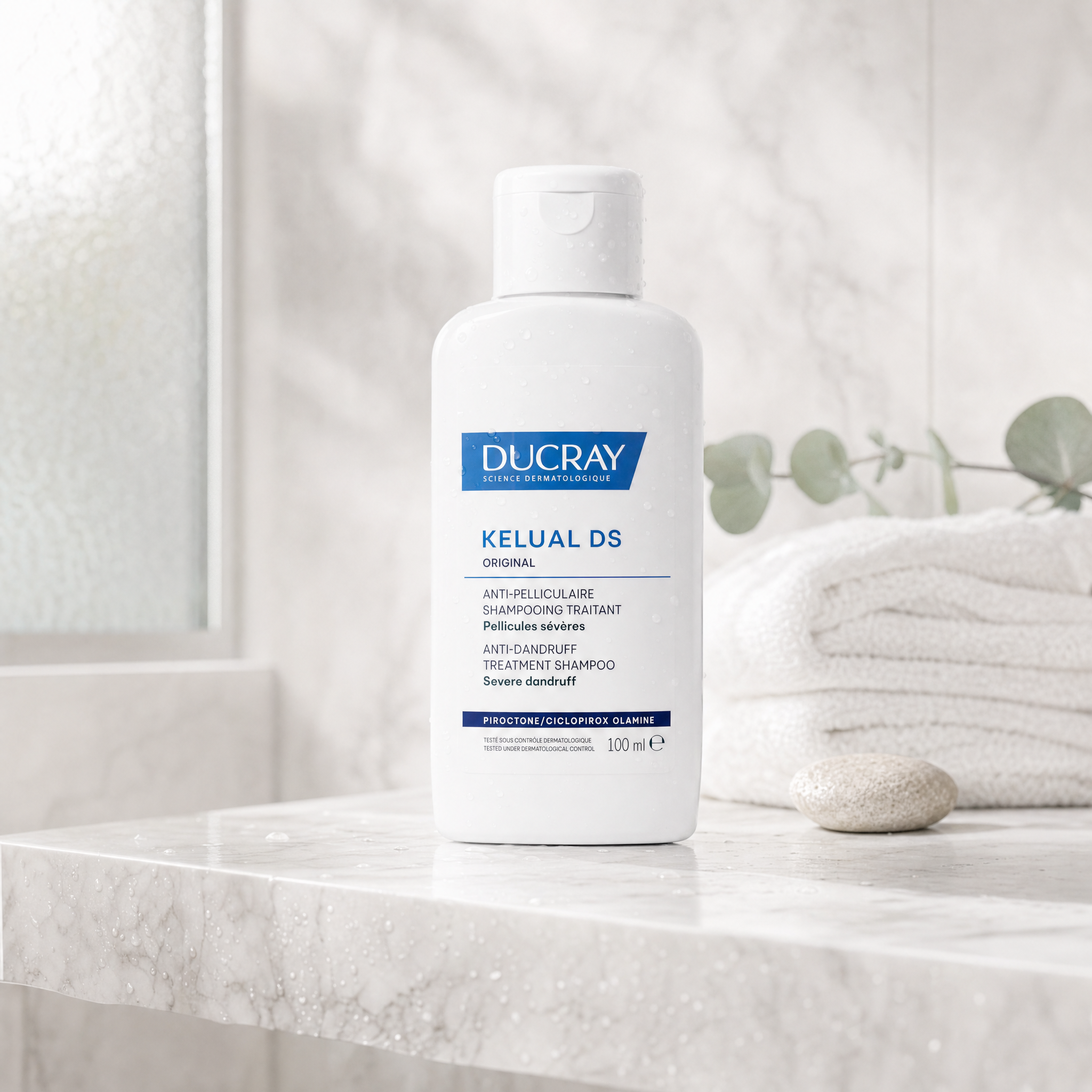 Ducray Kelual DS Anti-Dandruff Treatment Shampoo 100ml in modern luxury bathroom