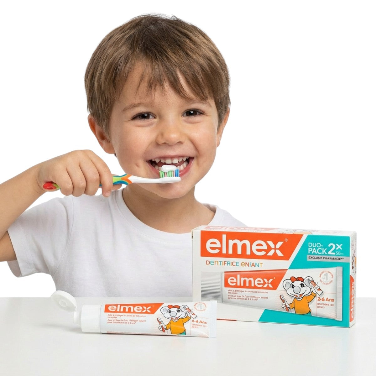Child brushing teeth with elmex kids toothpaste for ages 3–6, gentle daily cavity protection