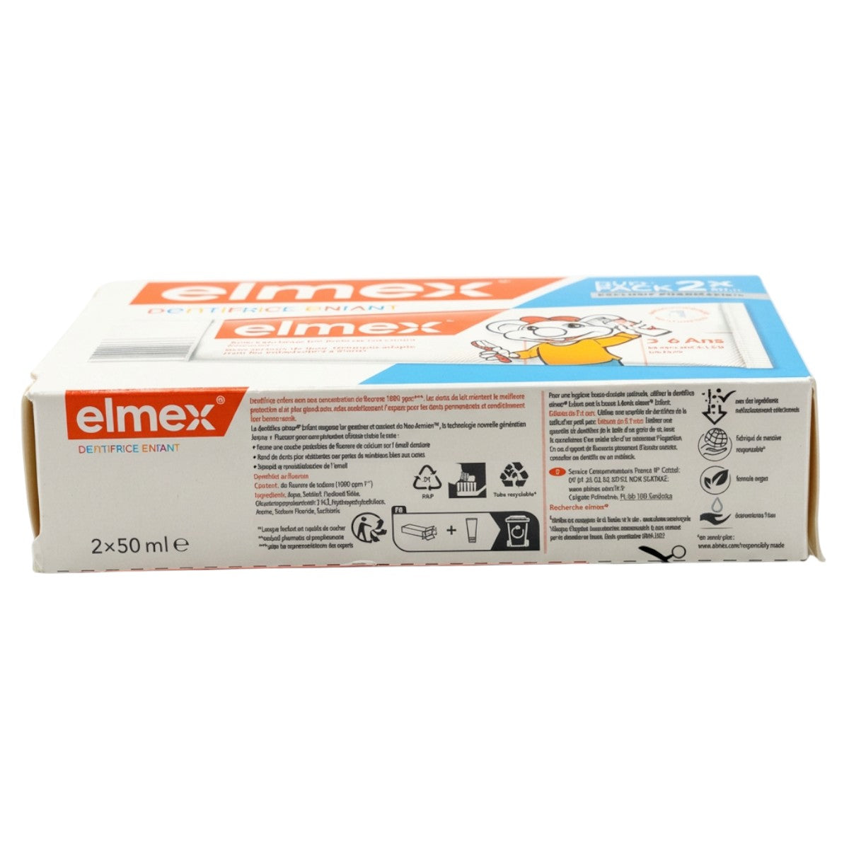 Elmex kids toothpaste packaging side view with product information and usage instructions