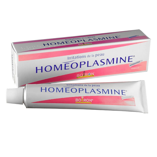 Homeoplasmine by Boiron balm packaging with box and tube on white background
