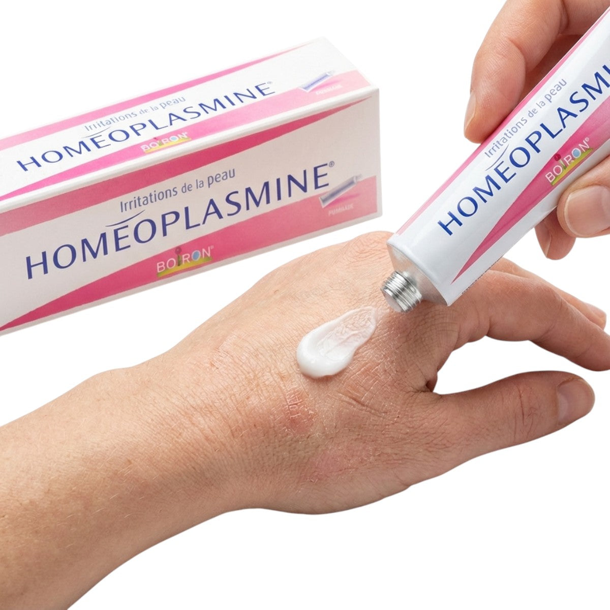 Homeoplasmine by Boiron multi-purpose balm texture applied on hand for daily skin care