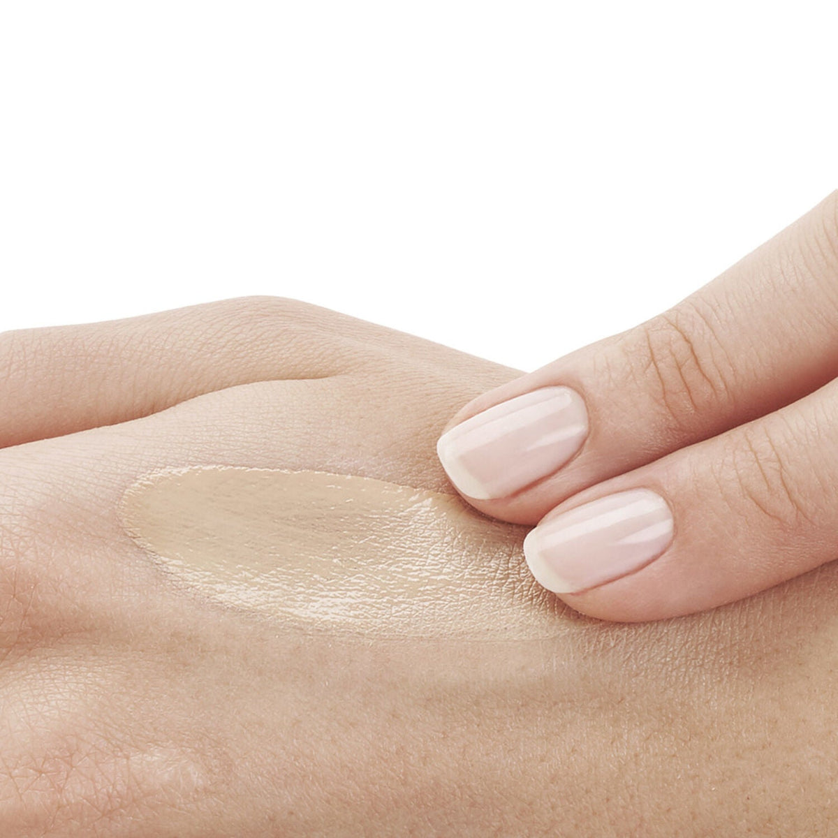 Vichy Capital Soleil Anti-Dark Spot 3-in-1 Tinted SPF 50 sunscreen texture on skin